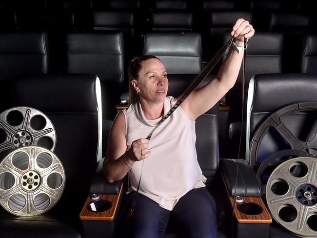 Event Cinemas Townsville City general manager Arlene Valantine with an reel of film. Picture: Evan Morgan