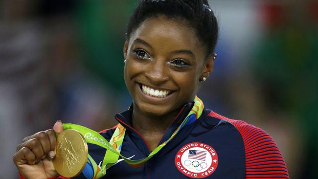 Simone Biles wins a gold medal at the 2016 Olympics in Rio de Janeiro. Picture: AFP