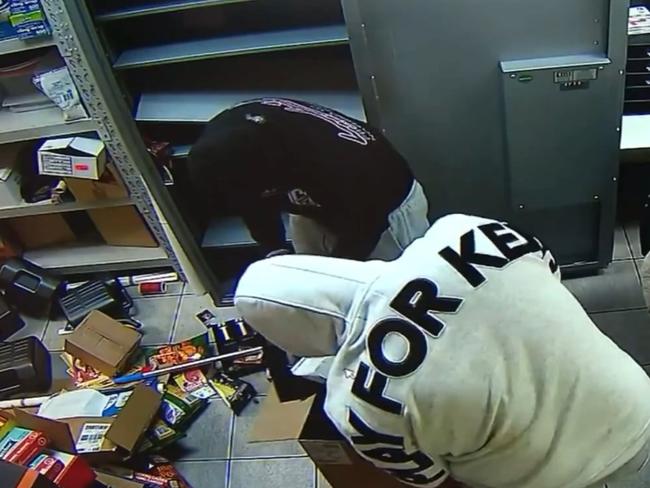 Masked intruders have broken into a Logan business twice in a matter of hours, threatening staff, smashing windows and stealing thousands of dollars worth of products. Picture: 9 News