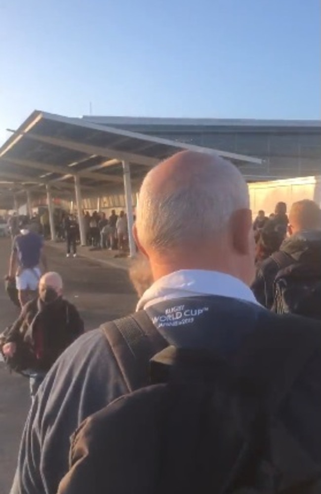 ‘Insane’ footage shows Sydney Airport’s security queue spilling out of the domestic terminal door and as far back as the car park. Picture: Twitter/aclennell