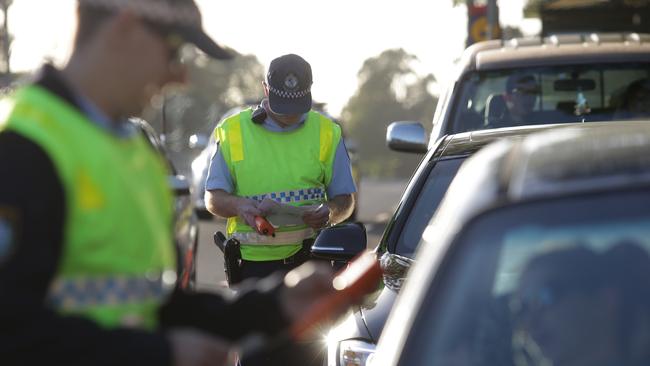 Police pulled over a driver whose car had stolen number plates.