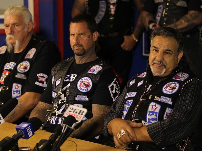 Senior Rebels holding a press conference at their Bringelly headquarters in 2012 in response to Strike Force Raptor’s targeting. National President Alex Vella is pictured on the right.