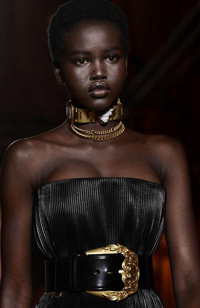 Adut Akech presents a creation by Versace in Milan. Picture: AFP