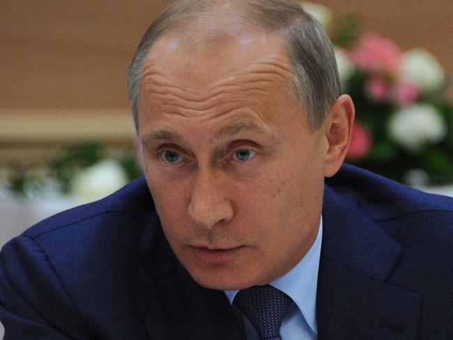 Russian President Vladimir Putin meets with young scientists at the Russian Experimental Physics Institute in the Sarov nuclear center, former Arzamas-16, in Sarov near Nizhny Novgorod, Russia, Friday, Sept. 19, 2014. (AP Photo/RIA-Novosti, Mikhail Klimentyev, Presidential Press Service)