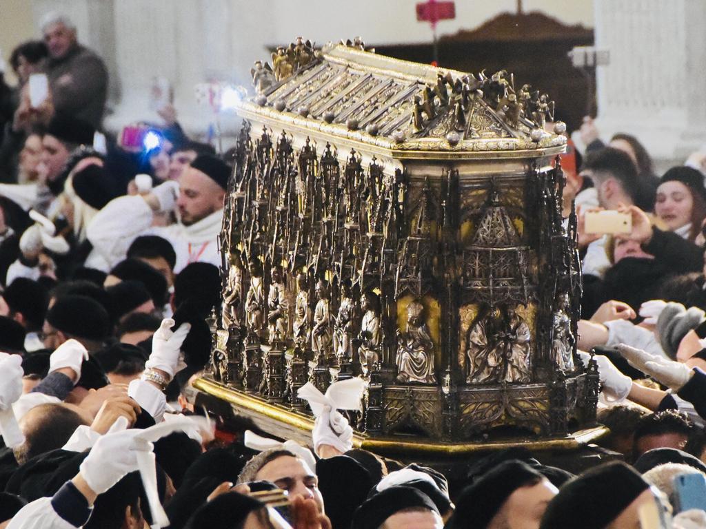 A silver coffin containing relics.