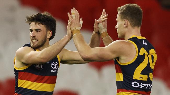 Lachlan Murphy celebrates a goal before going down against the Hawks at Marvel Stadium.