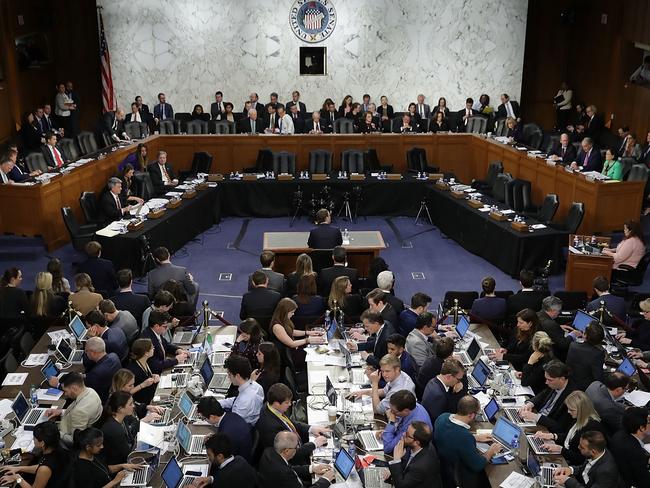 Reporters sit shoulder-to-shoulder behind Facebook co-founder, Chairman and CEO Mark Zuckerberg as he testifies before a combined Senate Judiciary and Commerce committee. Picture: AFP