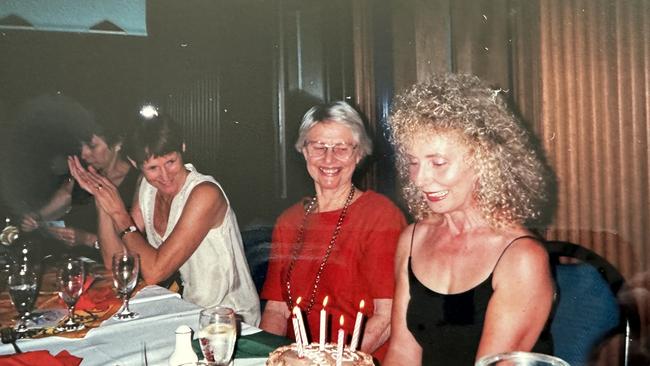 Beverley Brooker, right, at a gathering for her 50th birthday. Beverley changed her will six months before she died, leaving almost everything to her handyman, Jon Winfield.