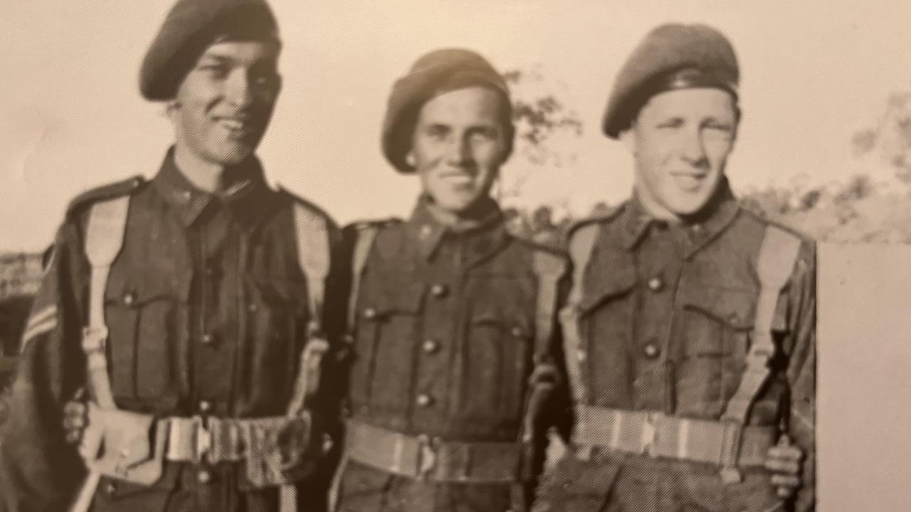 \Harvey Brown (centre) served in the 64th Infantry Battalion during World War II.