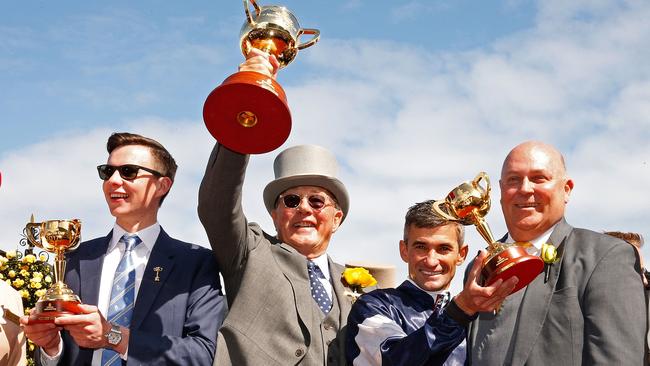 Co-owner of 2017 Melbourne Cup winner, Rekindling, Lloyd Williams (second left) says it’s time to stick with the omelette formula of light and heat rather than walking on eggshells. Picture: Getty Images