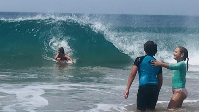 Tom, 16, Luke, 15 and Ruby Withers at Railways beach on the Fleurieu Peninsula. Picture: Fiona Graff