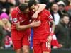 LIVERPOOL, ENGLAND - MARCH 01: Philippe Coutinho #10 of Liverpool celebrates with teammate Jordan Henderson of Liverpool after scoring his team's second goal during the Barclays Premier League match between Liverpool and Manchester City at Anfield on March 1, 2015 in Liverpool, England. (Photo by Clive Brunskill/Getty Images)