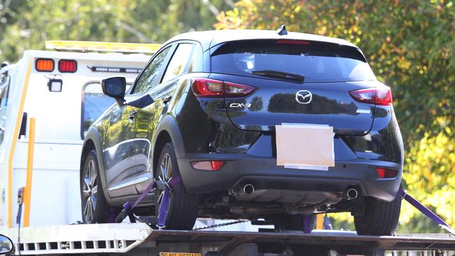 The Hawthorn stabbing victims’ car is towed from Coppin Grove. Picture: David Crosling