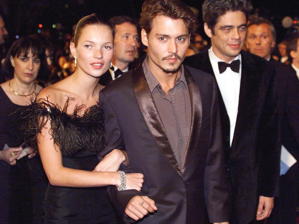 Johnny Depp with Kate Moss at film premiere in 1998. Picture: Patrick Hertzog/AFP