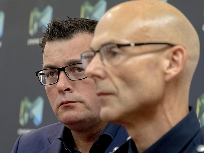 Victorian Premier Daniel Andrews with Victorian Police Deputy Commissioner Andrew Crisp. Picture: AAP Image/Luis Enrique Ascui