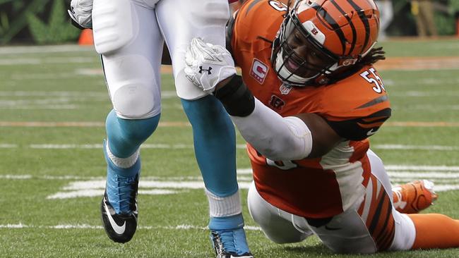 Cincinnati Bengals outside linebacker Vontaze Burfict tries to bring down Greg Olsen.