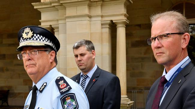 Queensland Police Commissioner Ian Stewart (left), Queensland Minister for Police and Minister for Corrective Services, Mark Ryan (centre) and Queensland Police Union President Ian Leavers (right) talking to the media. (AAP Image/Darren England)