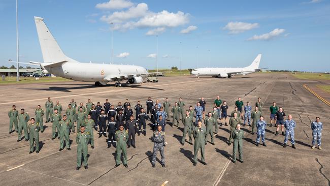 A Royal Australian Air Force P-8A Poseidon (background). P-8 aircraft are the core of our maritime patrol and anti-submarine warfare capability