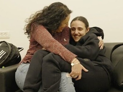 Roni Gonen (right) and her mother, Merav Leshem Gonen, embrace after Romi’s from Hamas captivity, January 19, 2025. Picture IDF.