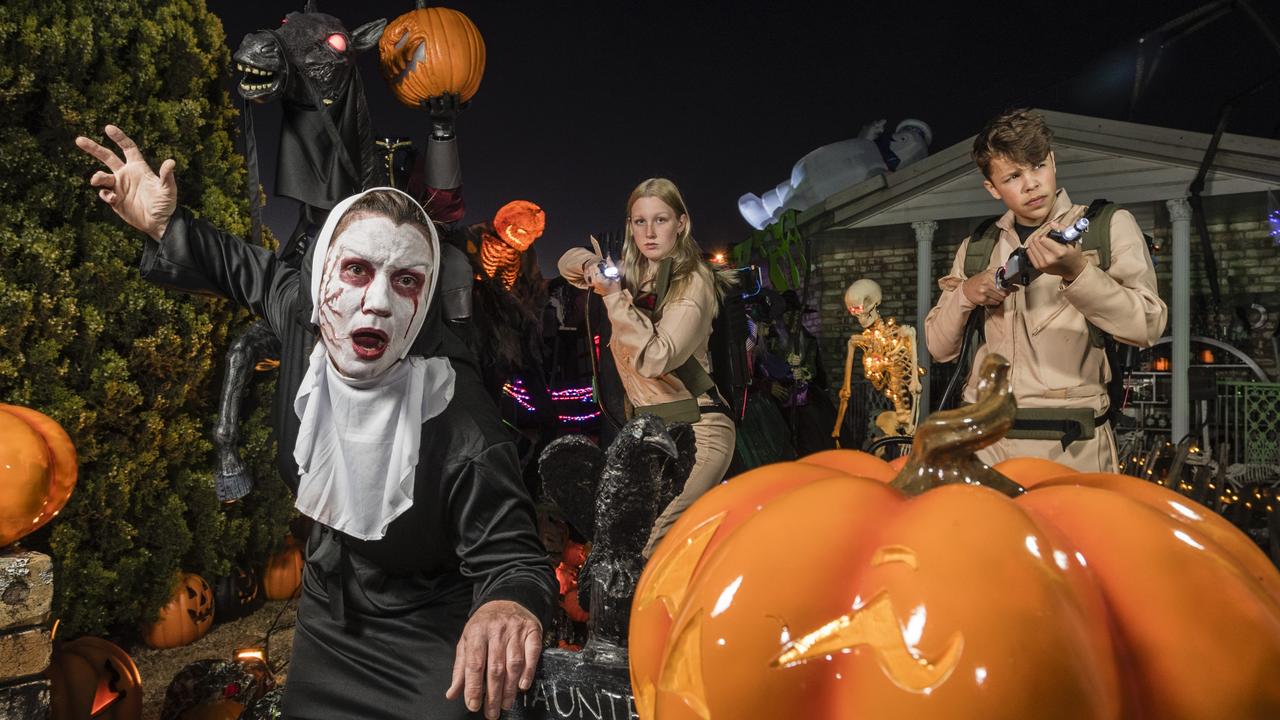 Ready for Halloween are (from left) Jo Philp, Isabell Philp and Anrich Prinsloo at the Philp family scare house in Cranley. Picture: Kevin Farmer