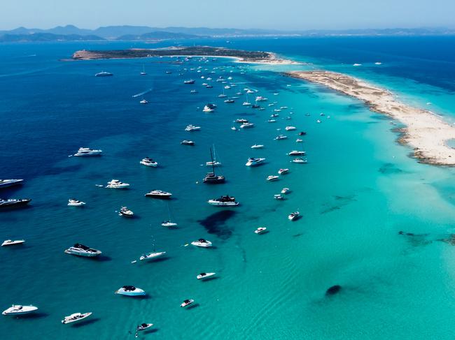 An aerial view of the beaches of Ses Illetes on the island of Formentera in the Balearic Islands, Spain