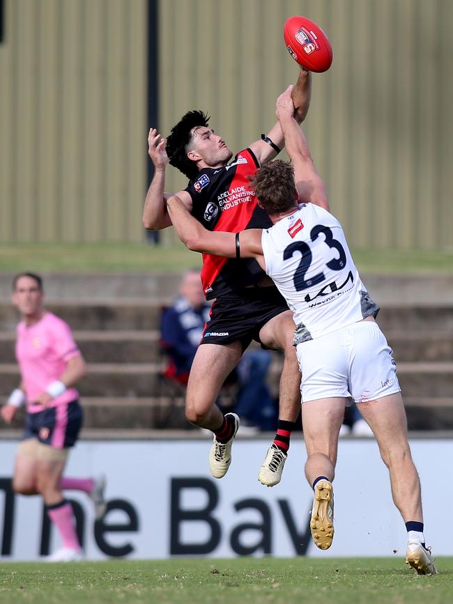 South’ Sam Skinner spoils West’s Ned Stevens’ attempt to mark.. Picture: Dean Martin