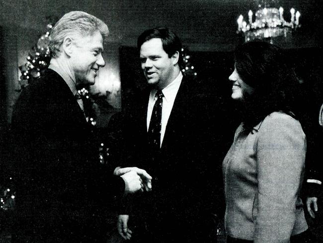 Scandalous ... Monica Lewinsky meeting President Bill Clinton at a White House Christmas party in December 16, 1996