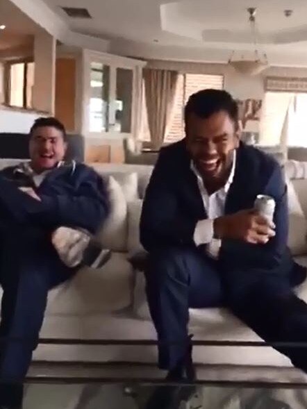 Stu Laundy and Kurtley Beale are seen laughing in the leaked video.