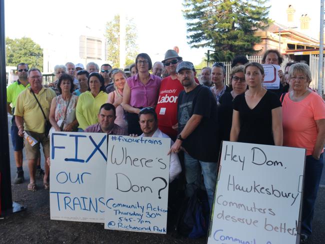 Macquarie federal Labor MP Susan Templeman (centre, in purple) spoke with train commuters about their concerns at Richmond Park last Thursday night.