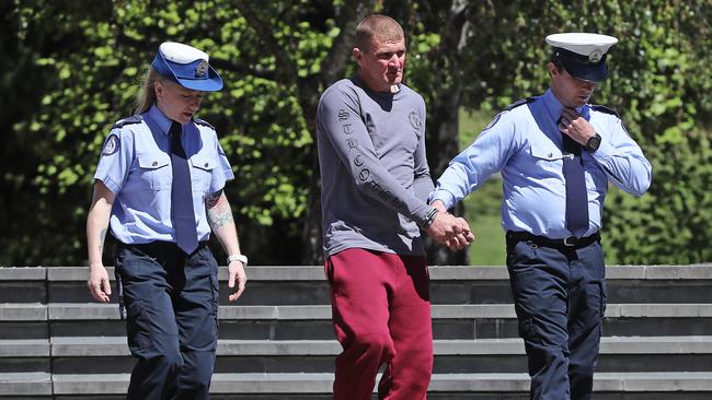 Shane Andrew Fazackerley leaving the Supreme Court after pleading guilty to assault of a police officer.