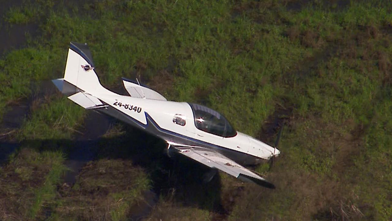 Pilot assessed by paramedics after plane crash on the Gold Coast