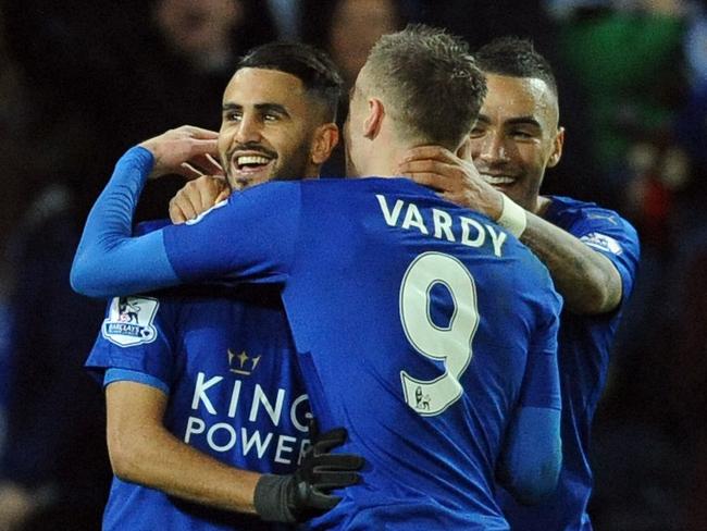 Leicester players Daniel Drinkwater, left, Riyad Mahrez, Jamie Vardy, Danny Simpson, right, celebrate after Leicester’s Leonardo Ulloa scored against Stoke during the English Premier League soccer match between Leicester City and Stoke City at the King Power Stadium in Leicester, England, Saturday, Jan. 23, 2016. (AP Photo/Rui Vieira)