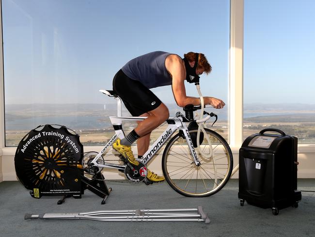Cameron does some simulated altitude training at his home in Mt Rumney