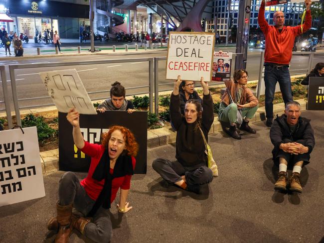 Families of Israeli hostages held by Palestinian militants in the Gaza Strip protest outside the ministry of defence in Tel Aviv. Picture: AFP