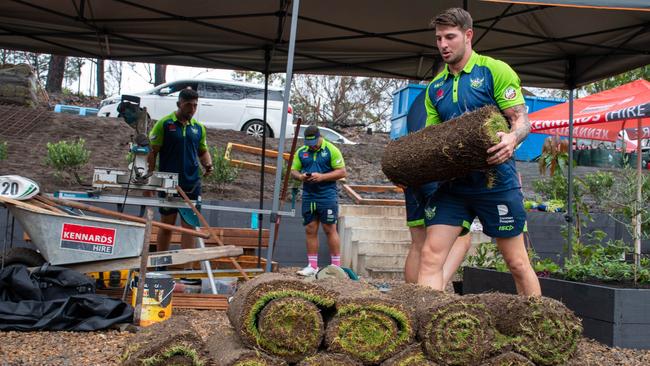 Scott with fellow Canberra players helping out in the bushfire-affected town of Mogo on the NSW south coast earlier this month. Picture: Canberra Raiders