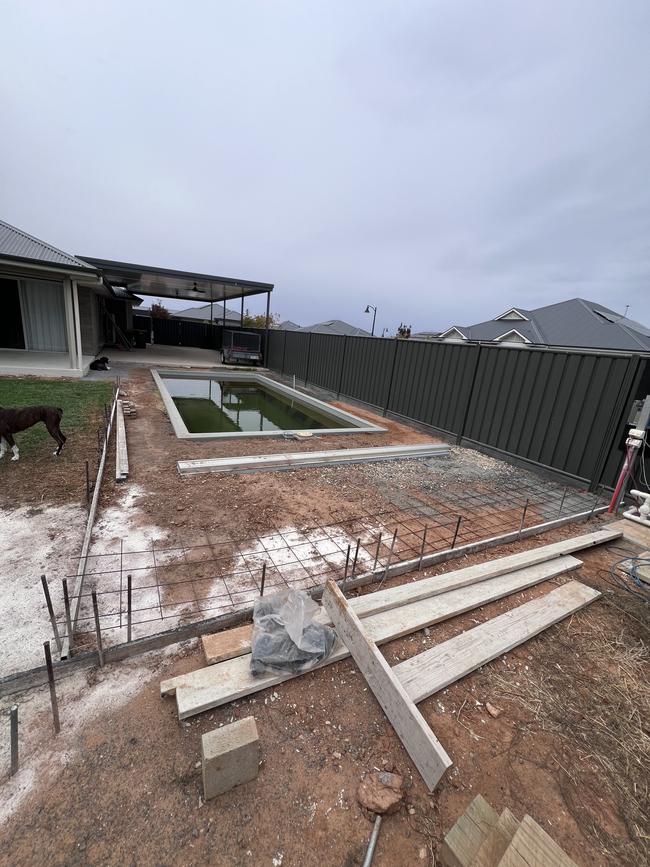 Kelly Bunker and Gary Prause hired Adelaide Exposed Concrete to concrete their backyard, but the job was never finished. Picture: Supplied