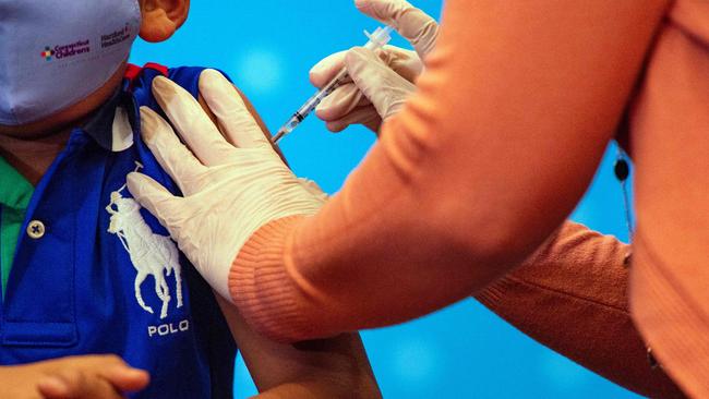 Pfizer has found in trials that 90 per cent of those vaccinated kids will be spared symptoms if they catch Covid. Picture: AFP