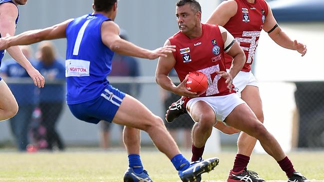 Ex-West Coast Eagle Daniel Kerr takes the ball for Tyabb against Hastings on Saturday. Picture: Jason Sammon.