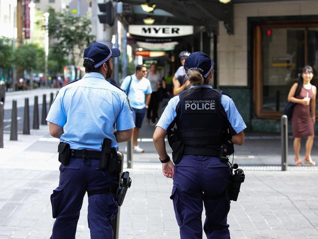 SYDNEY, AUSTRALIA - NewsWire Photos JANUARY, 13, 2021: Police are seen walking George Street in Sydney CBD, with 5 new cases of Covid-19 reported in the last 24 hours across Sydney, Australia. Picture: NCA NewsWire / Gaye Gerard