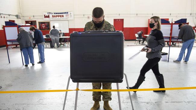 A voter fills out a ballot in North Carolina today. Picture: AFP