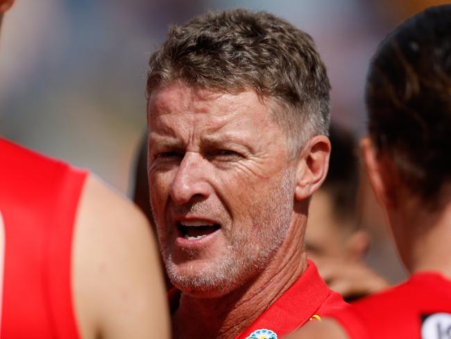 ADELAIDE, AUSTRALIA - APRIL 07: Damien Hardwick, Senior Coach of the Suns addresses his players at water time during the 2024 AFL Round 04 match between the Gold Coast SUNS and GWS GIANTS at Adelaide Hills - Mt Barker on April 07, 2024 in Adelaide, Australia. (Photo by Dylan Burns/AFL Photos via Getty Images)