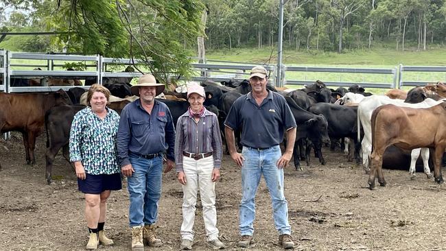 Maxine and Peter Moohin (sellers), Sue Pickersgill (buyer) and Kent Street, of Ray White Sarina, at the Yalboroo property.