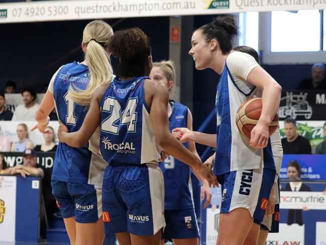 Rockhampton Cyclones' captain and star centre Lara McSpadden with her teammates. Photo: Amy Trinca