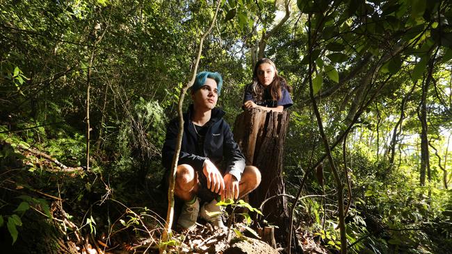 Burleigh Heads park is being overrun by noxious weeds. Visitors Jett Righetti, 17, and Kiana Schokman, 16, from Brisbane were shocked to find the majority of greenery were weeds. Picture: Glenn Hampson