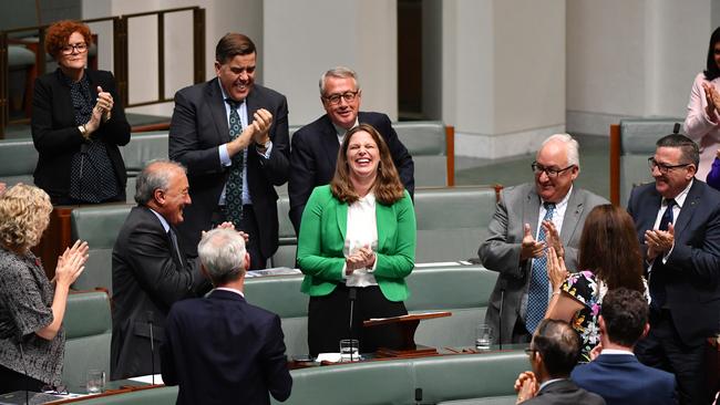 Labor member for Adelaide Kate Ellis is applauded after making her valedictory speech. Picture: Mick Tsikas/AAP