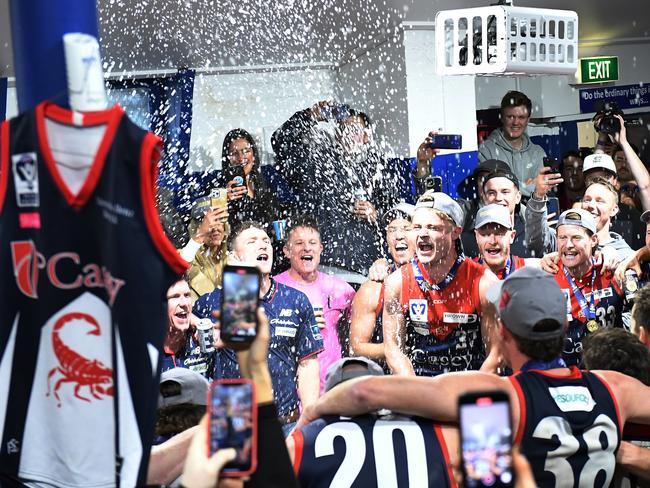 MELBOURNE, AUSTRALIA - SEPTEMBER 18: Casey Demons celebrate after the 2022 VFL Grand Final match between the Casey Demons and the Southport Sharks at Ikon Park on September 18, 2022 in Melbourne, Australia. (Photo by Felicity Elliott/AFL Photos via Getty Images)