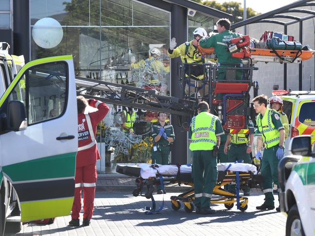 Ambulance and MFS crews work at the scene. Picture: Tricia Watkinson