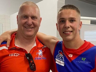 Jason and Charlie Clarke before the game.