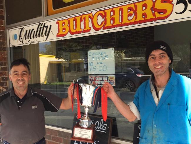 The local butchers with the premiership cup. Picture: Facebook