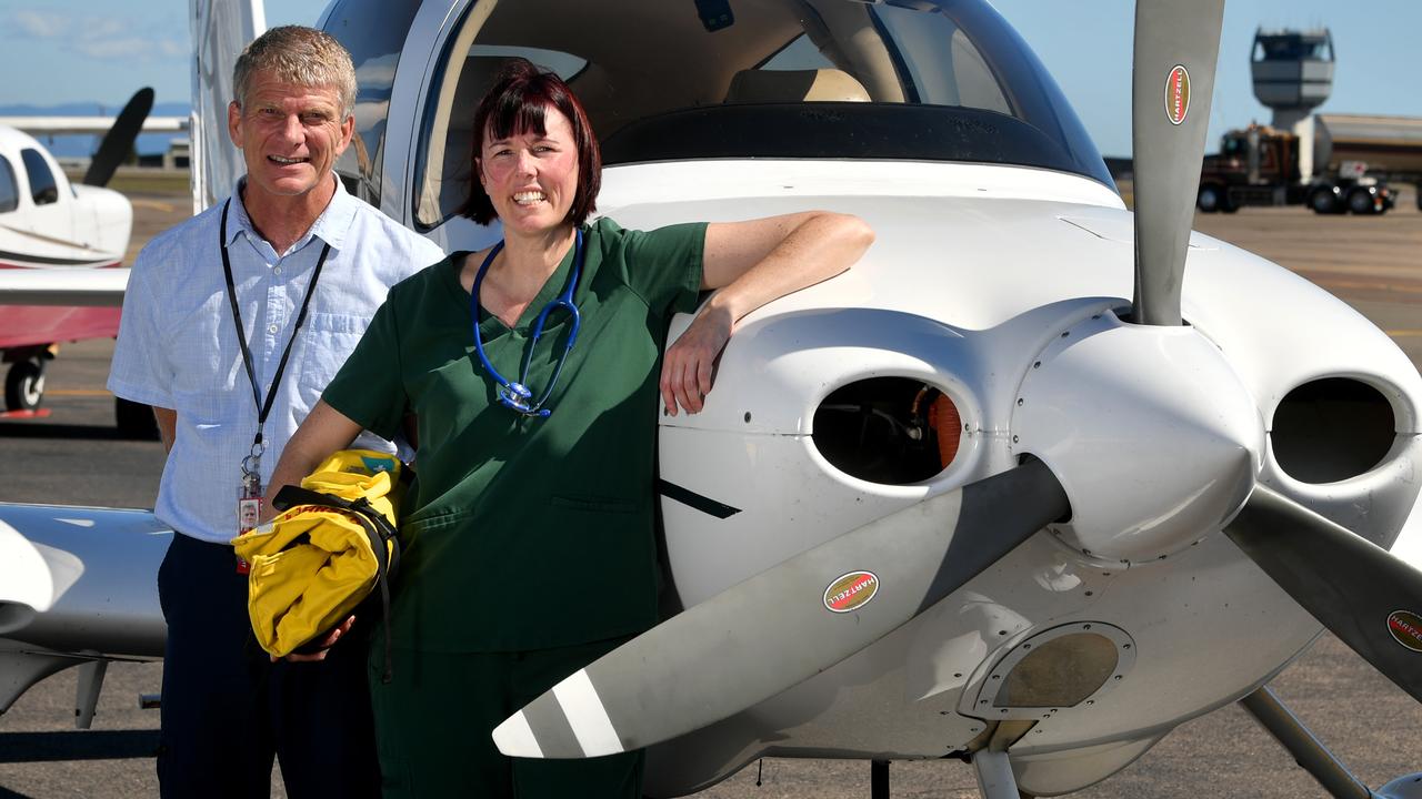 Dr O'Brien with pilot Russell Dunkin. Picture: Evan Morgan